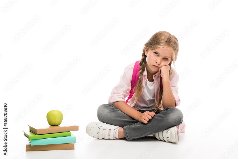 bored schoolgirl with books with apple bored schoolgirl with books with apple