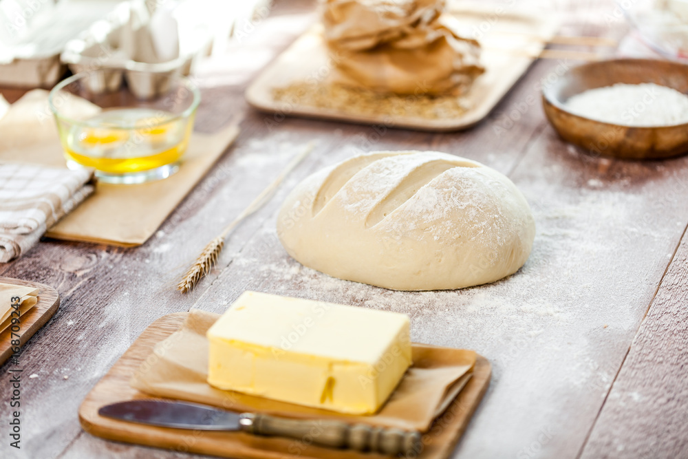 fresh dough on kitchen rustic wooden table. fresh dough on kitchen rustic wooden table.
