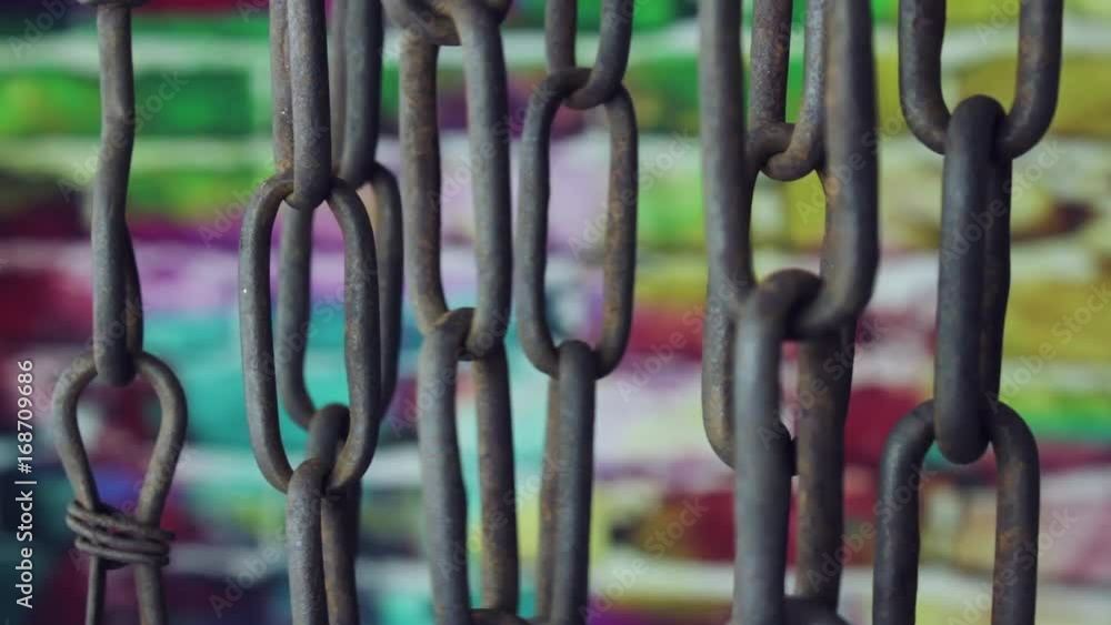 Old chain on color background Old chain on color background