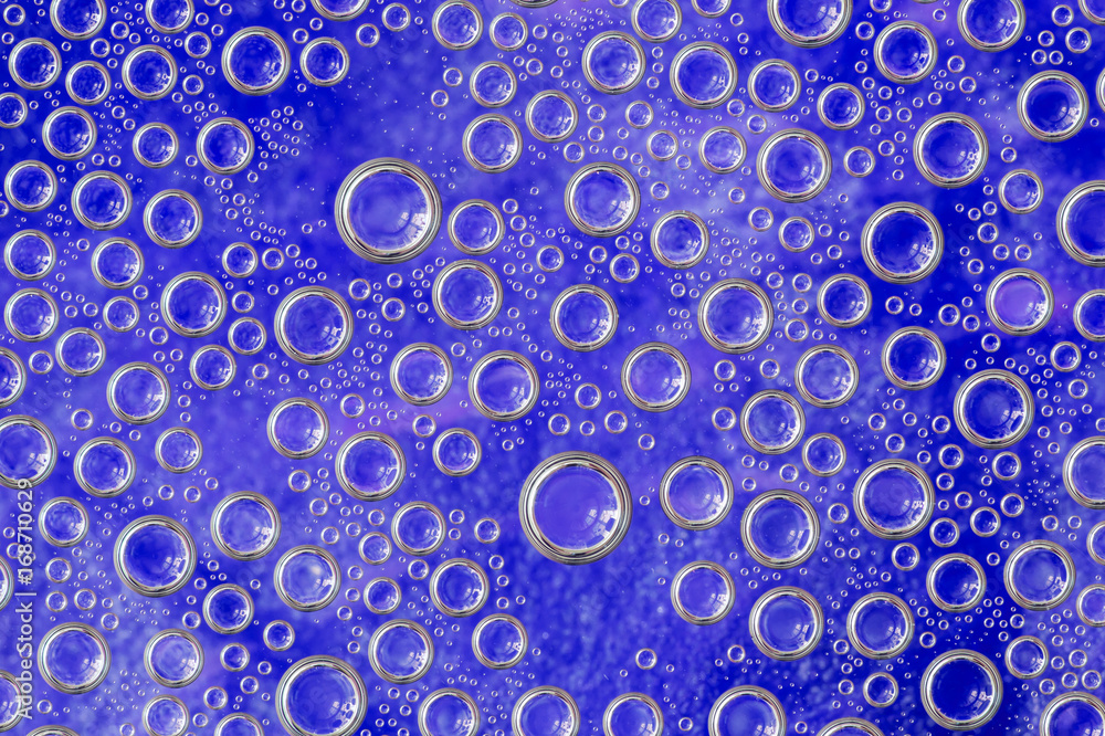 Condensate. Blue water drops background. Close-up Condensate. Blue water drops background. Close-up