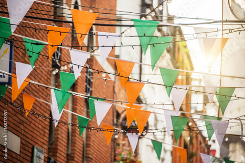 Canvas Print Garland with irish flag colors in a street of Dublin, Ireland - Saint Patrick da