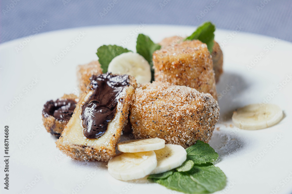 Banana dessert in breaded with chocolate Banana dessert in breaded with chocolate