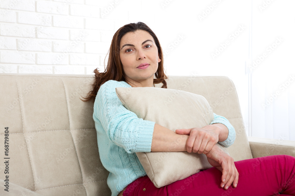 Beauty woman with white perfect smile looking at camera at home Beauty woman with white perfect smile looking at camera at home