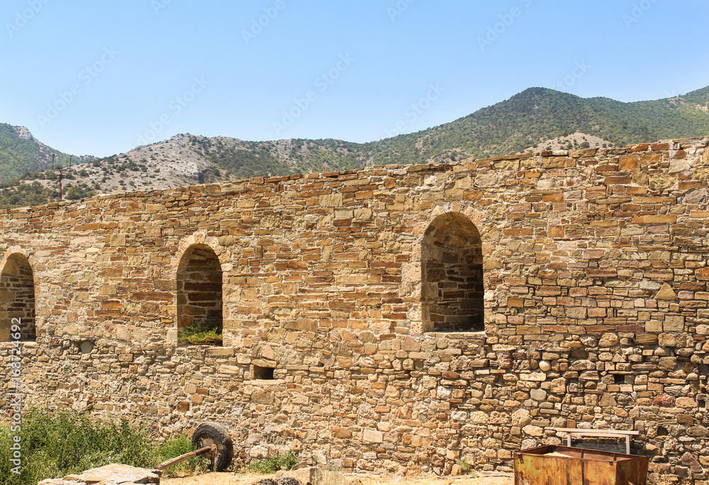 Arched openings in the fortress wall.