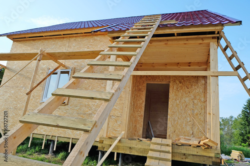 construction of wooden frame-panel house