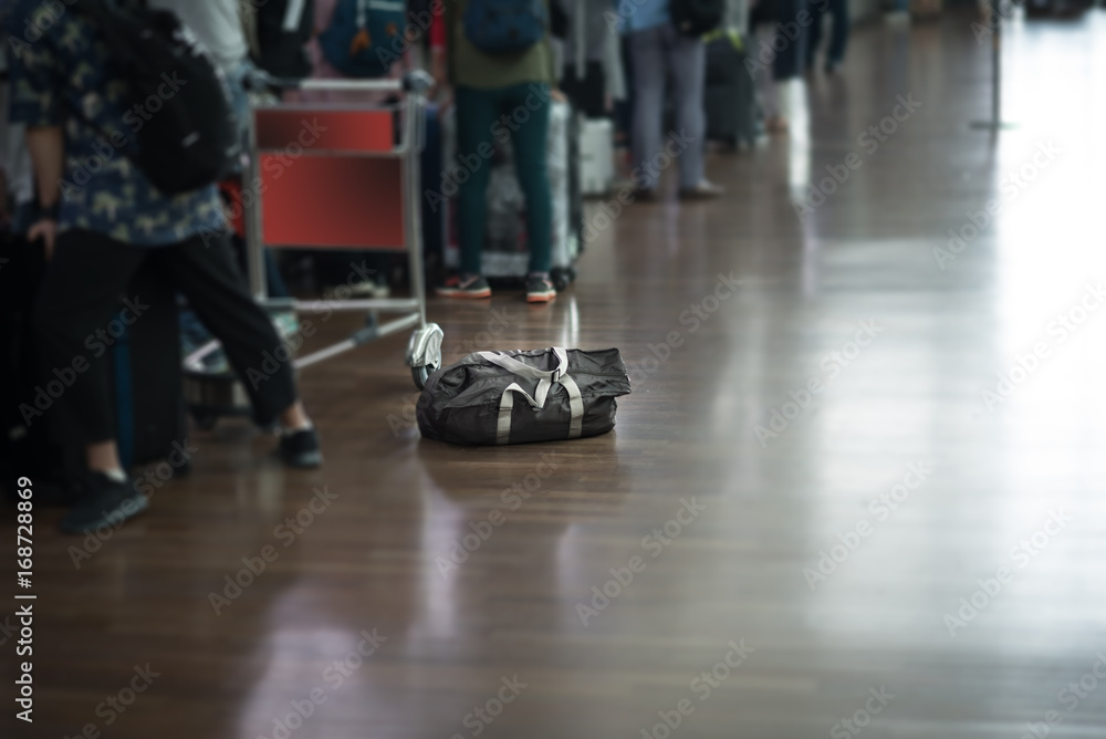 A Travel bag on tile floor