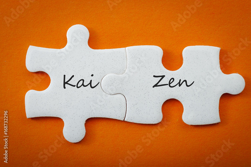Obraz na płótnie Business concept and interconnected puzzle pieces that put the words “kai” meaning