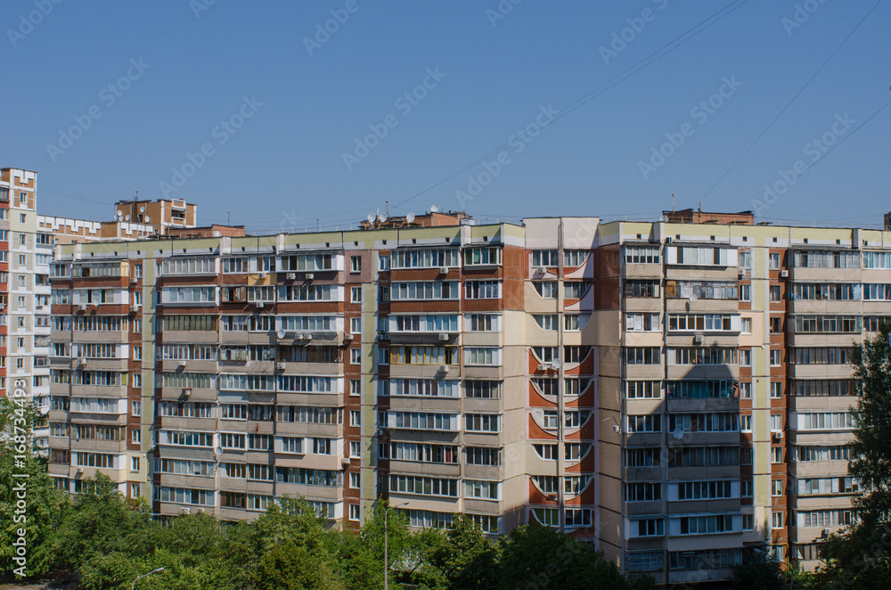 soviet era residential buildings in the green capital of Ukraine, Kiev, on a sunny summer day