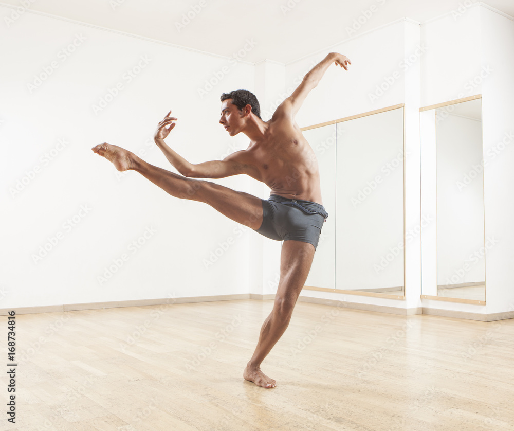 Naklejka premium young and beautiful professional ballet dancer performing