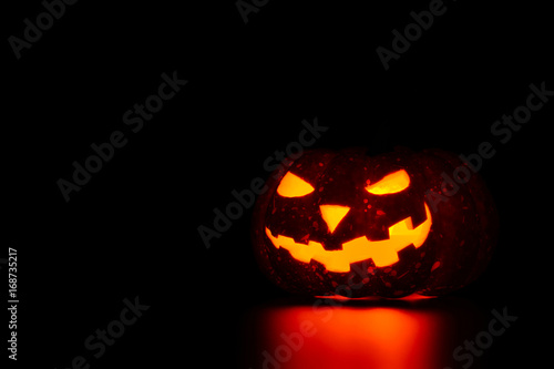 Spooky pumpkin with candle insight