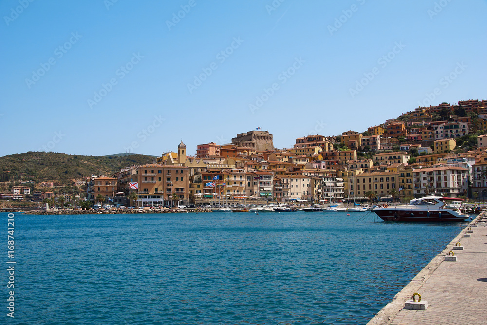The port of Porto Santo Stefano with its spanish fort, Italy