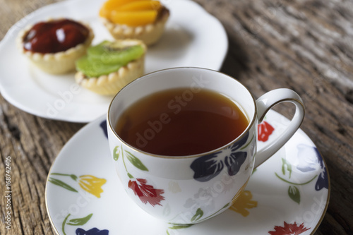 A cup of tea and small tarts