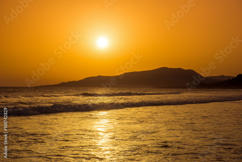 Incredibly beautiful sunset on the beach in Spain © Kamil_k2p
