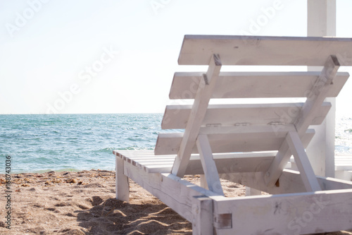 White wooden sun chair on seaside © Ocskay Mark
