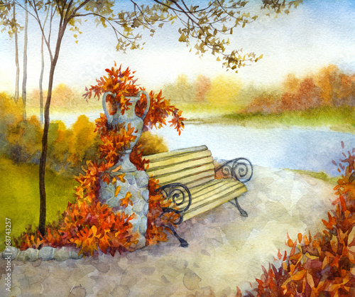 Decorative bench in autumn park photo