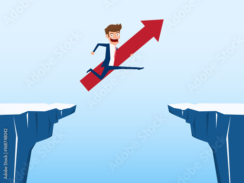 Businessman with red arrow sign jump through the gap between hill. Running and jump over cliffs. Business risk and success concept.
