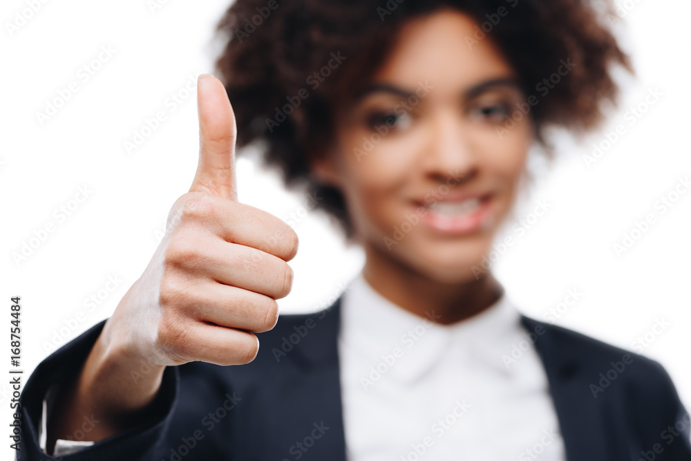 businesswoman showing thumb up businesswoman showing thumb up