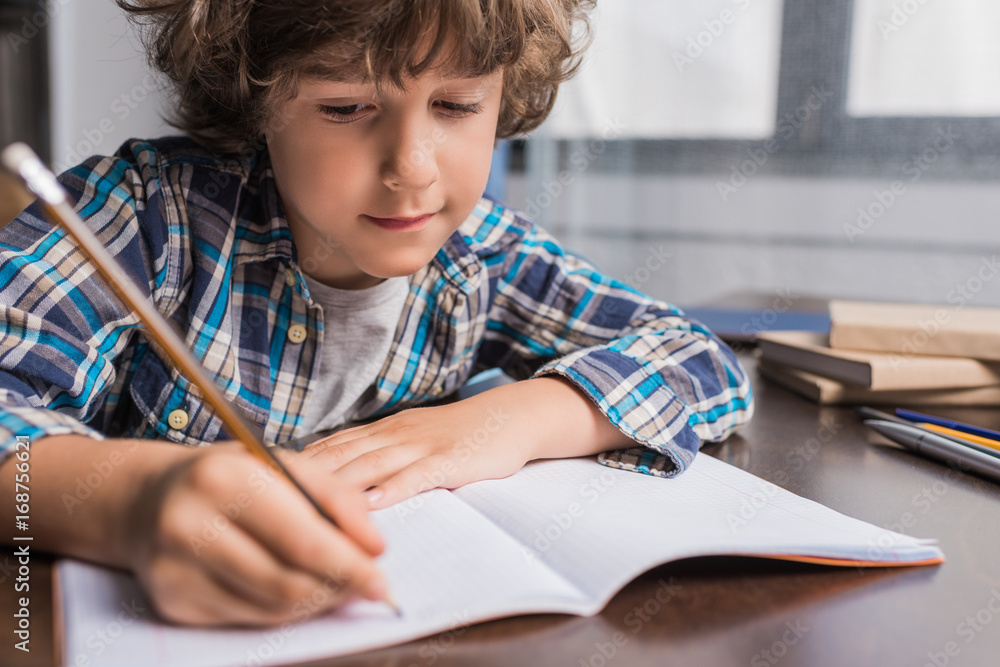 kid doing homework kid doing homework