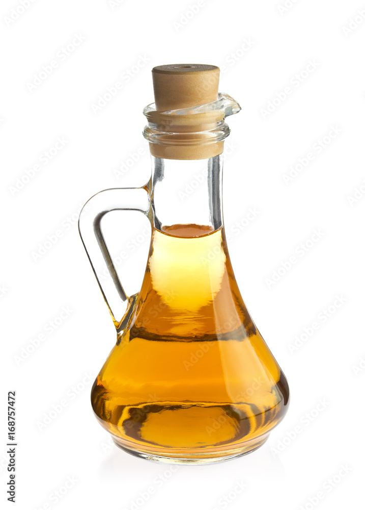 Decanter with organic apple vinegar, isolated on white Decanter with organic apple vinegar, isolated on white