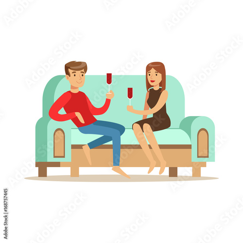 Young couple in love sitting on a light blue sofa and drinking wine, people resting at home vector Illustration