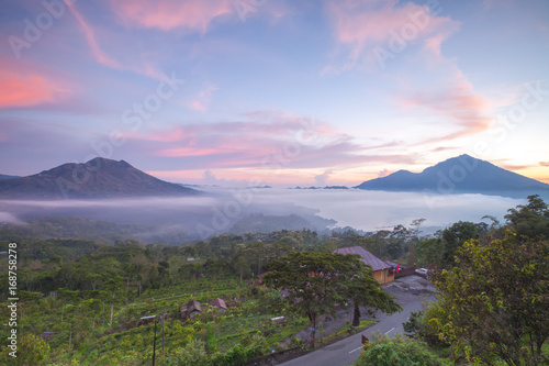 Kintamani volcano and Lake Batur in the morning, viewed from Penelokan are a popular sightseeing destination in Bali's central highlands, Indonesia. photo