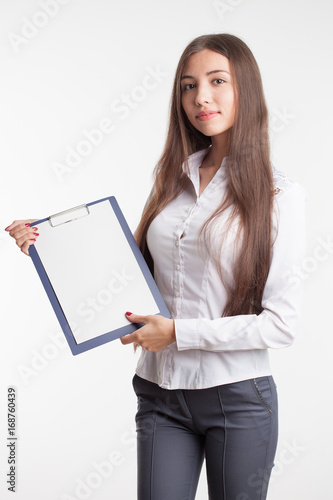 Beautiful woman wearing formal wear. Secretary with clipboard