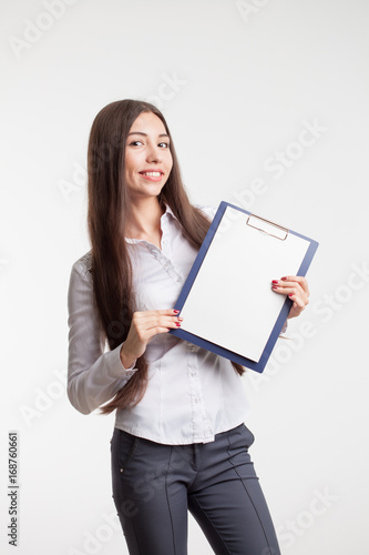 Beautiful woman wearing formal wear. Secretary with clipboard