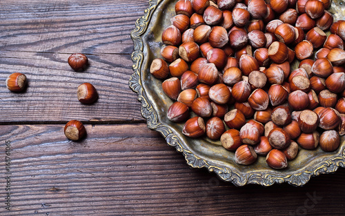 Hazelnuts on an iron plate