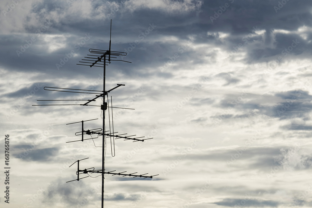 TV Antenna on sky background with cloud. TV Antenna on sky background with cloud.