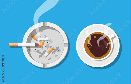 Coffee cup and ashtray full of smokes cigarettes.
