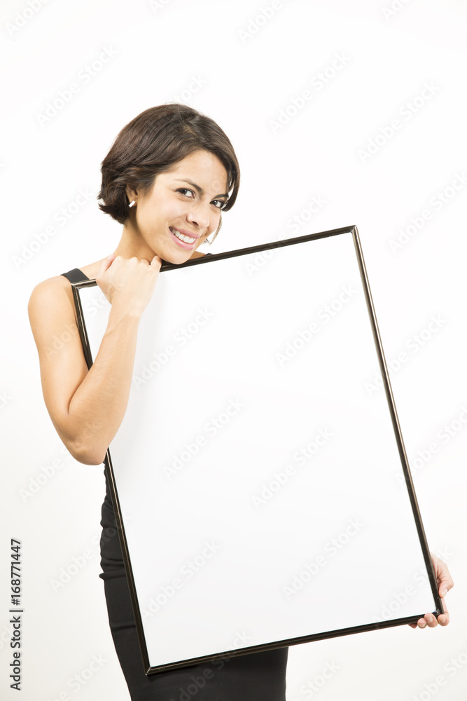 Beautiful young woman holding a blank sheet of paper Beautiful young woman holding a blank sheet of paper