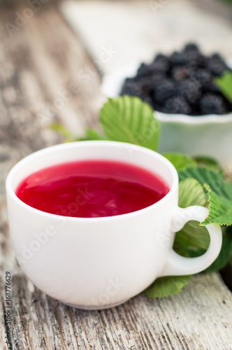 Cup of tea and blackberry