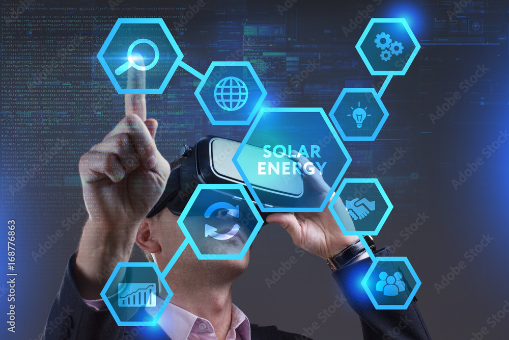 Business, Technology, Internet and network concept. Young businessman working on a virtual screen of the future and sees the inscription: Solar energy Business, Technology, Internet and network concept. Young businessman working on a virtual screen of the future and sees the inscription: Solar energy
