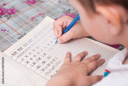 boy doing his homework.