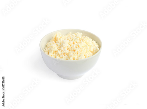 rustic cheese from melted milk in a bowl on white background