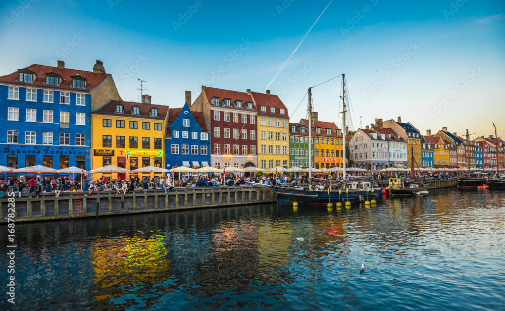 Nyhavn district is one of the most famous landmarks in Copenhagen, Denmark