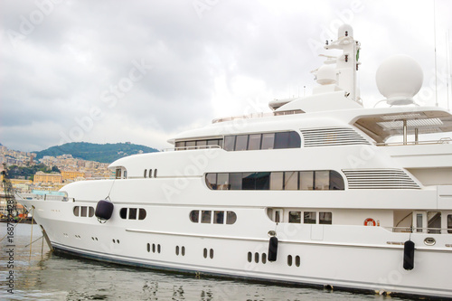 Luxury yachts parked in harbor Genoa Italy. © parntawan1987