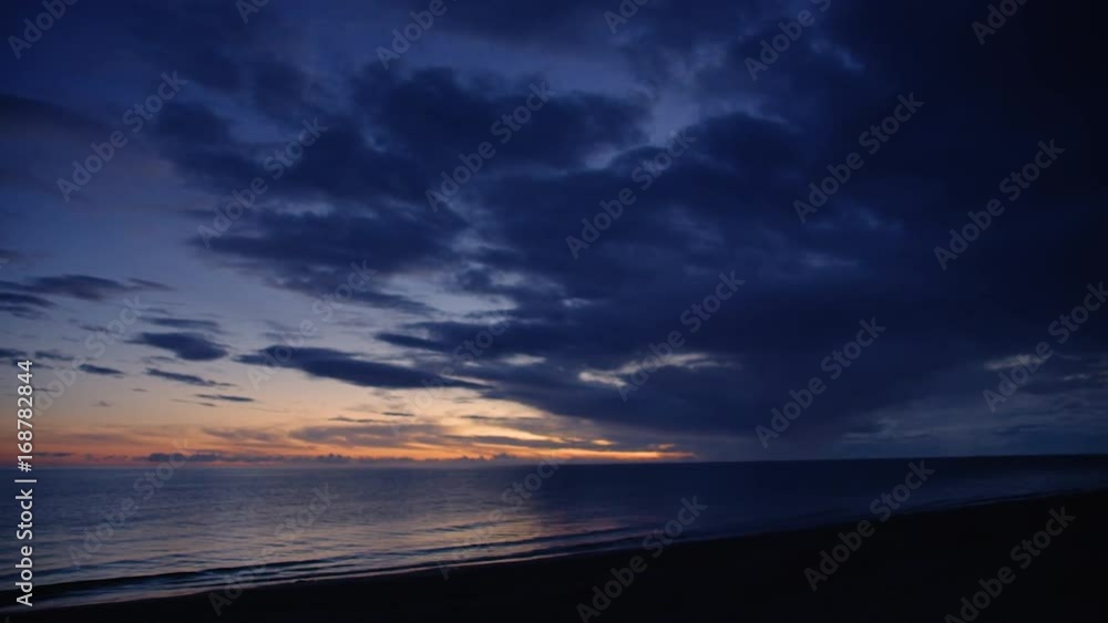 A wide shot of a beach panning shot to the right. A wide shot of a beach panning shot to the right.