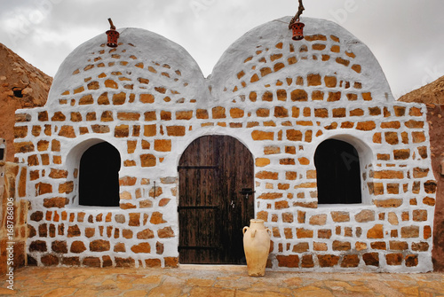 Tunisian Granery. Old ruins of a building, Ksar Ouled Debbab, Tataouine, Tunisia. Starwars film shooting place photo