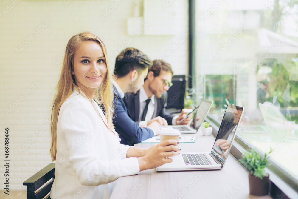 beautiful businesswoman feel happy drinking coffee during work at the Cafe , business concept beautiful businesswoman feel happy drinking coffee during work at the Cafe , business concept
