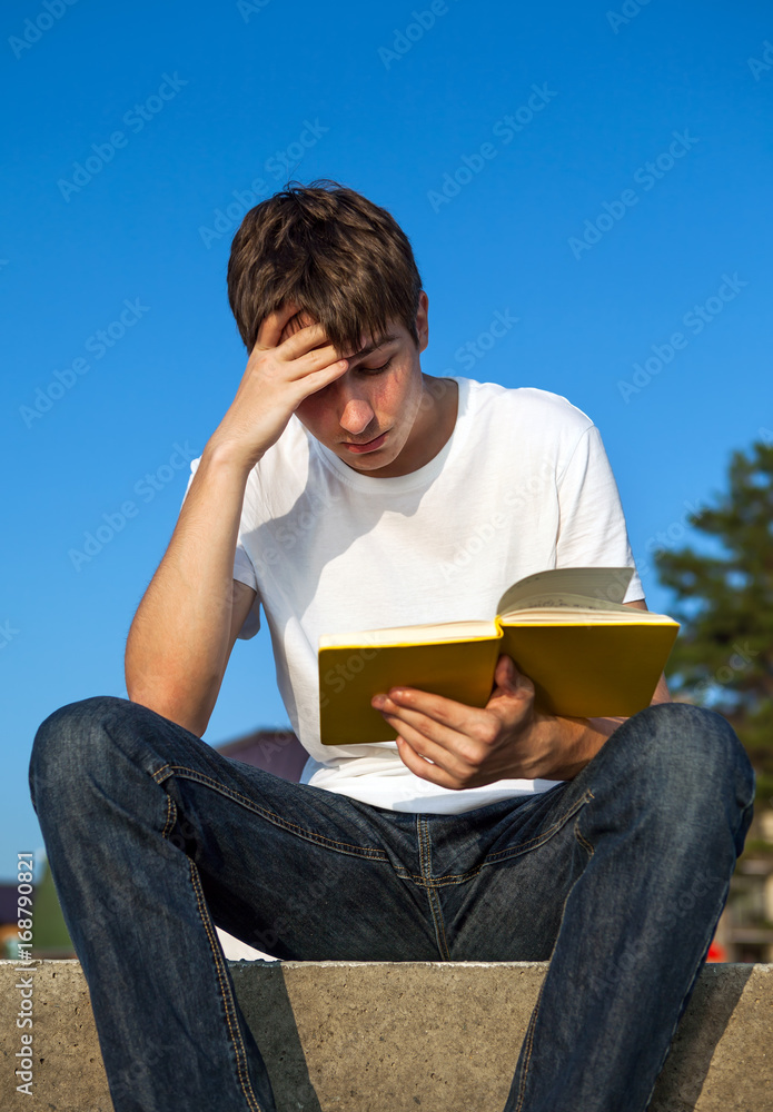 Young Man read a Book Young Man read a Book