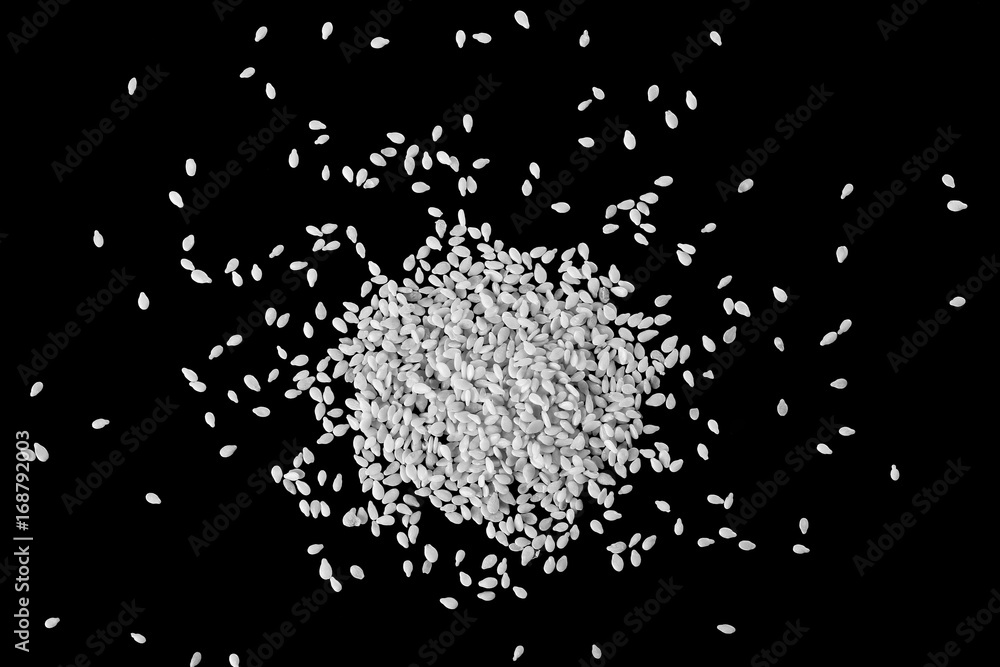 Pile sesame seed isolated on black background, with clipping path, top view Pile sesame seed isolated on black background, with clipping path, top view