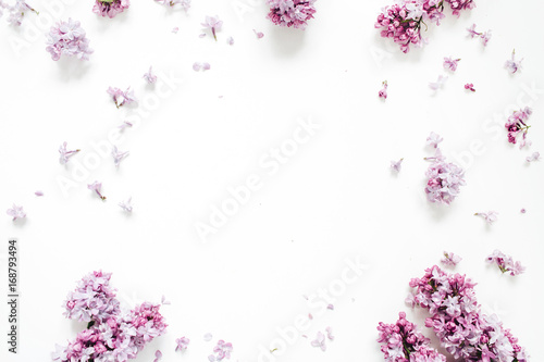 Photo Frame of lilac flowers with space for text on white background