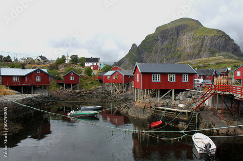 Houses and boats off the coast. Islands of Lofoten, Norway.