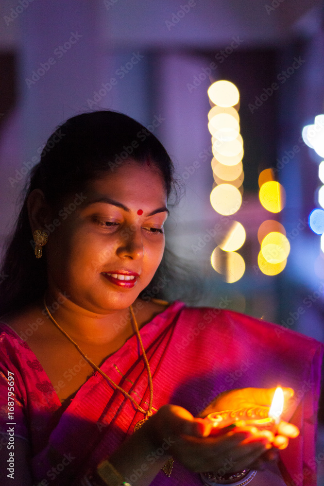 Woman with oil lamp Stock Photo Adobe Stock
