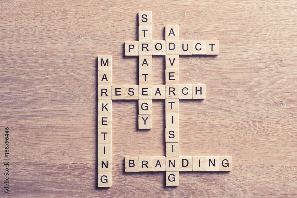 Conceptual business keywords on table with elements of game maki Conceptual business keywords on table with elements of game maki