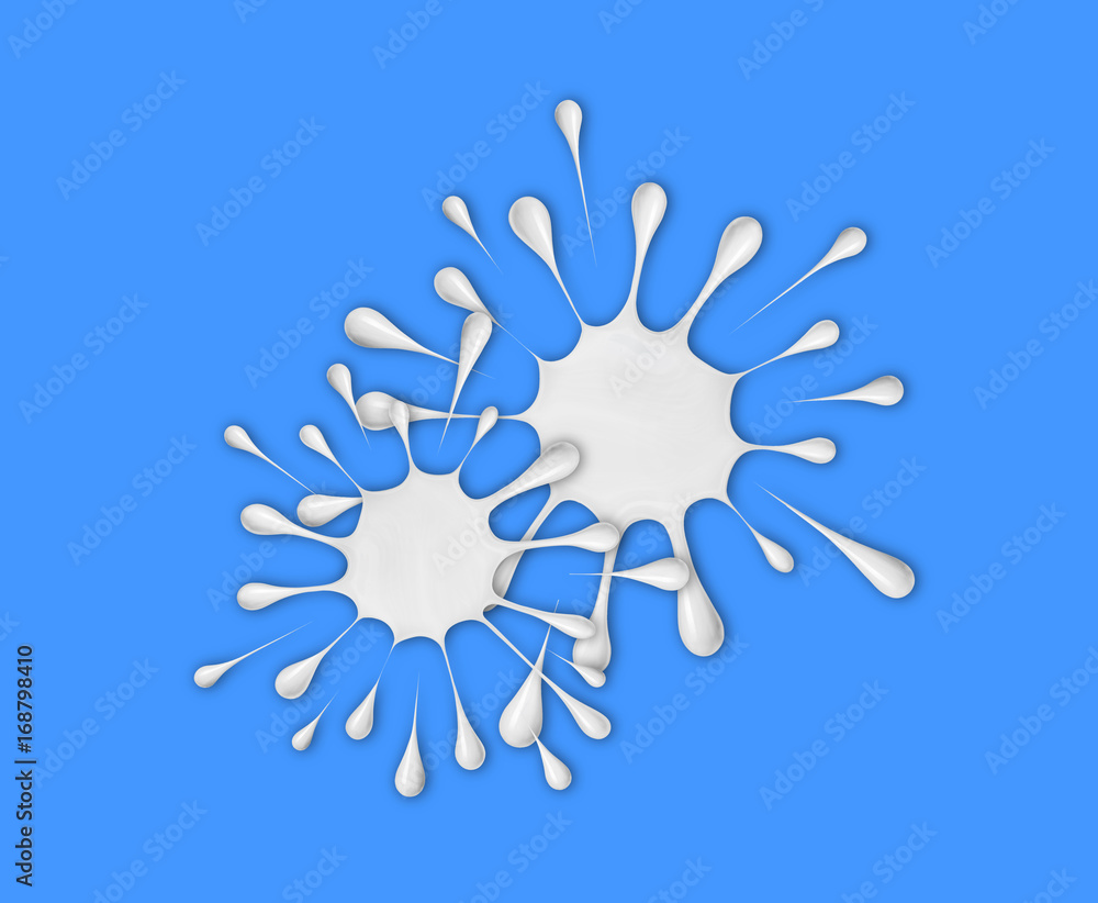 Two splashes of milk on a blue background Two splashes of milk on a blue background