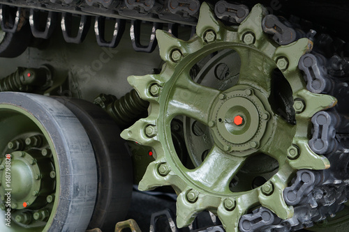 Elements of the running gear of a military vehicle. Background. Close-up