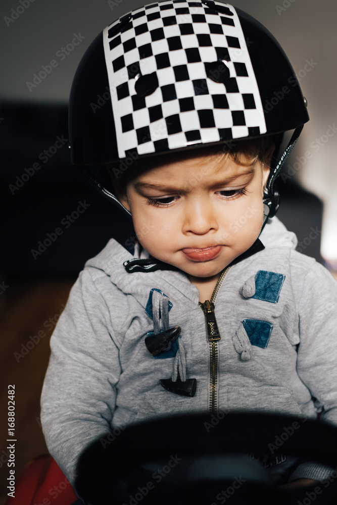 Toddler Playing in a Car Toy Toddler Playing in a Car Toy