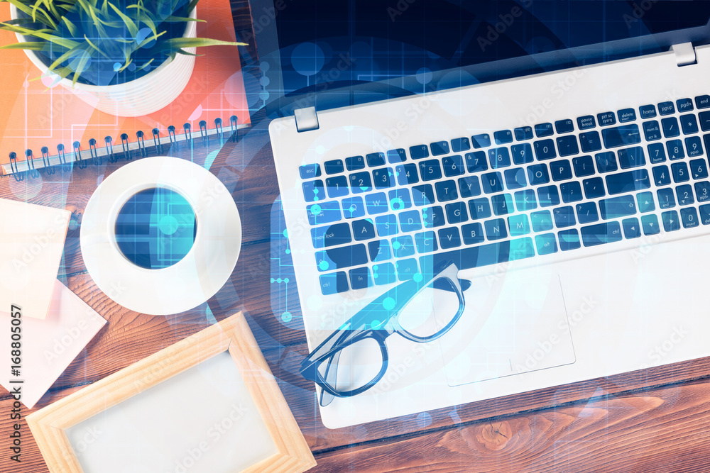 Business workplace with laptop coffee cup and security concept o Business workplace with laptop coffee cup and security concept o